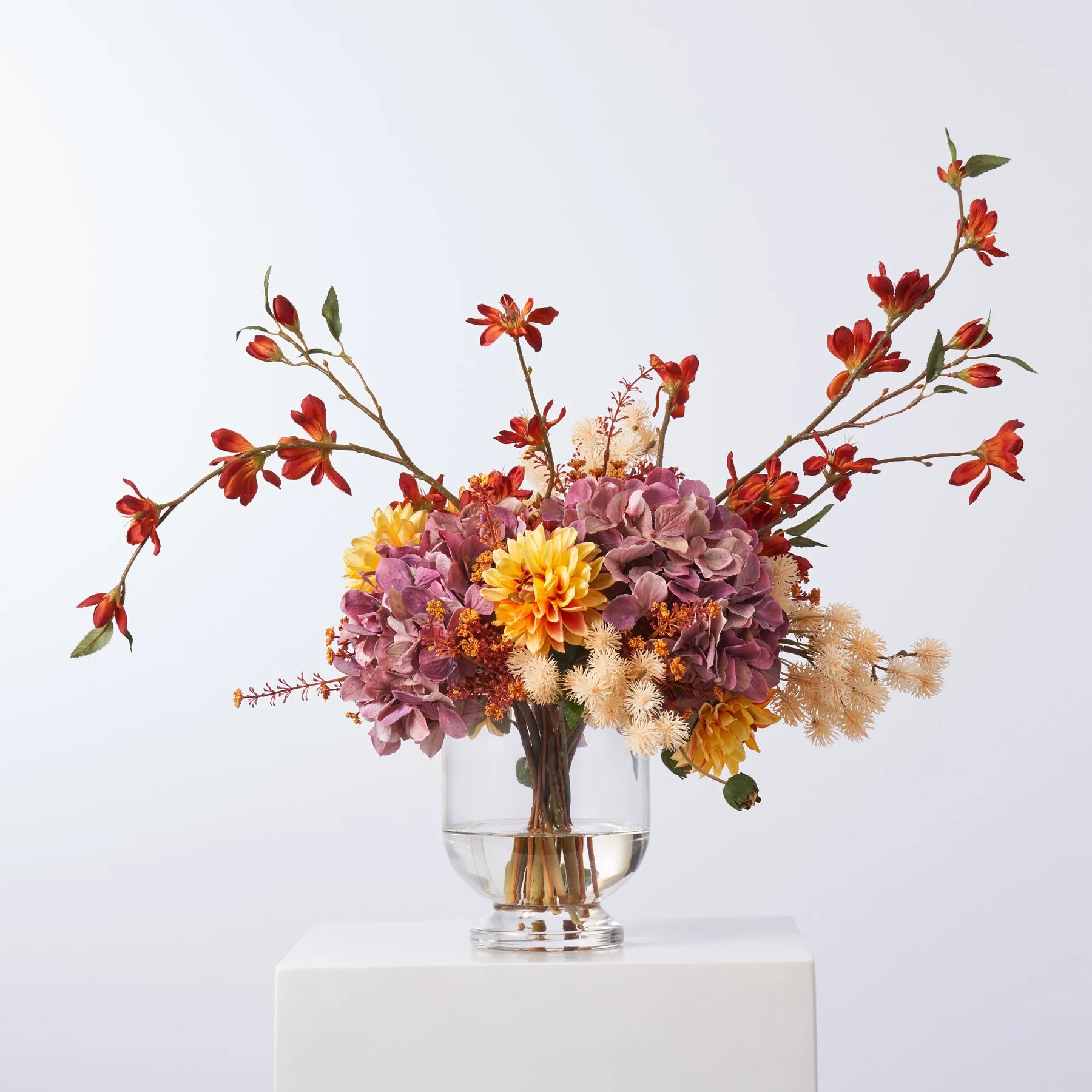 Autumn Sunrise - Mauve Hydrangea, Yellow Orange Dahlia, Mini Magnolia & Thistle Pods Fall Floral Water Illusion Arrangement